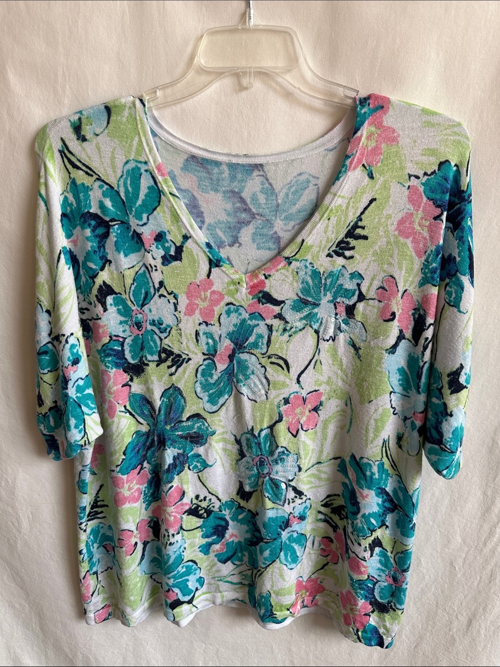 Chico’s short-sleeve V-neck sweater with teal and pink floral pattern, size XL